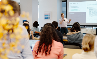 Person speaking in front of an audience