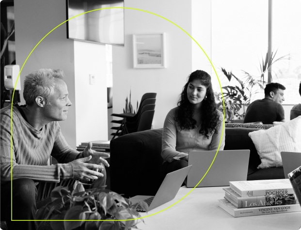 Two people talking in an office